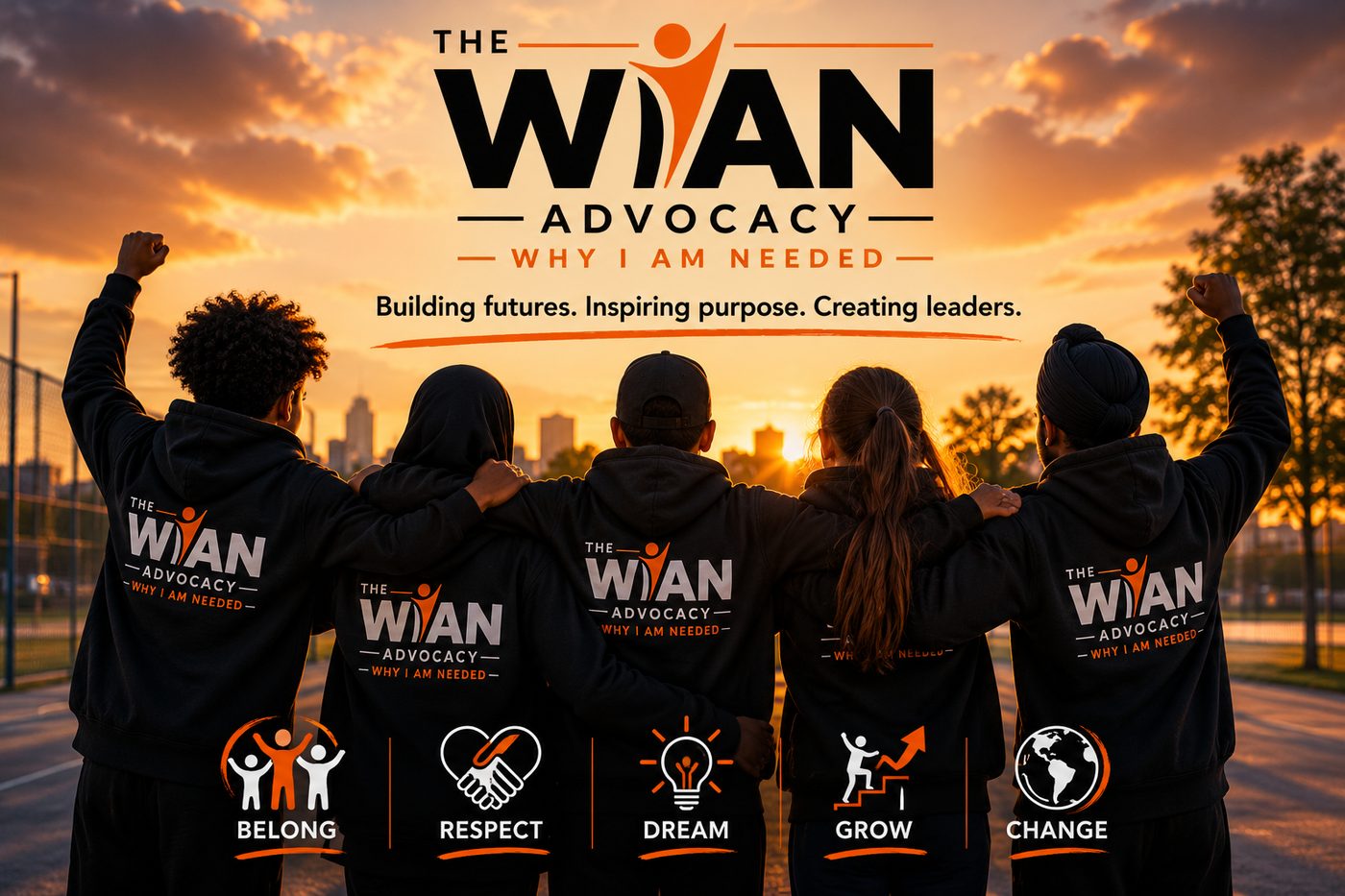 Young people from The WIAN Advocacy in a team huddle on a sports pitch, wearing branded WIAN hoodies